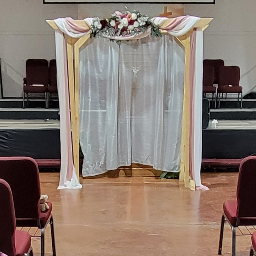 Wedding arch floral swag and fabrics